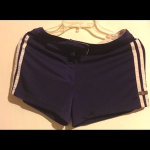 Women’s Adidas 3 Stripes Track Shorts.